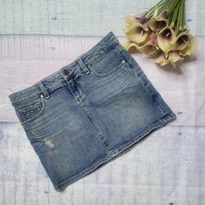Paige distressed Malibu mini Jean skirt